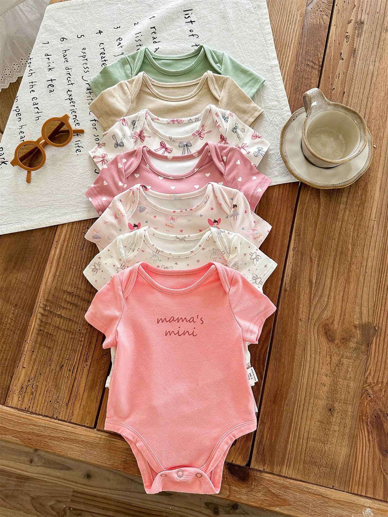SHEIN LMoss Kids 7pcs/Set Newborn Baby Girl Summer Cute Cartoon Pattern Knitted Short Sleeve Bodysuit Set