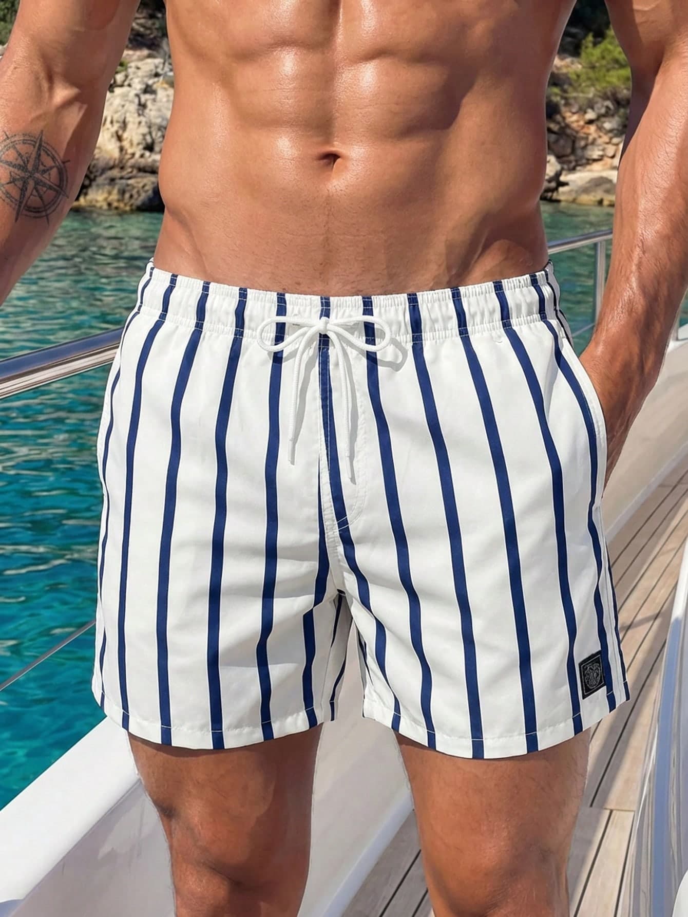 Manfinity Swimmode Swim Trunks For Men Drawstring Waist Security Pockets Lightweight 4-Way Stretch Letter Patches,Stripes For Resort Casual,Beach VacationWhite Fabric Non-Stretch Lined Beach Shorts,Hawaiian
