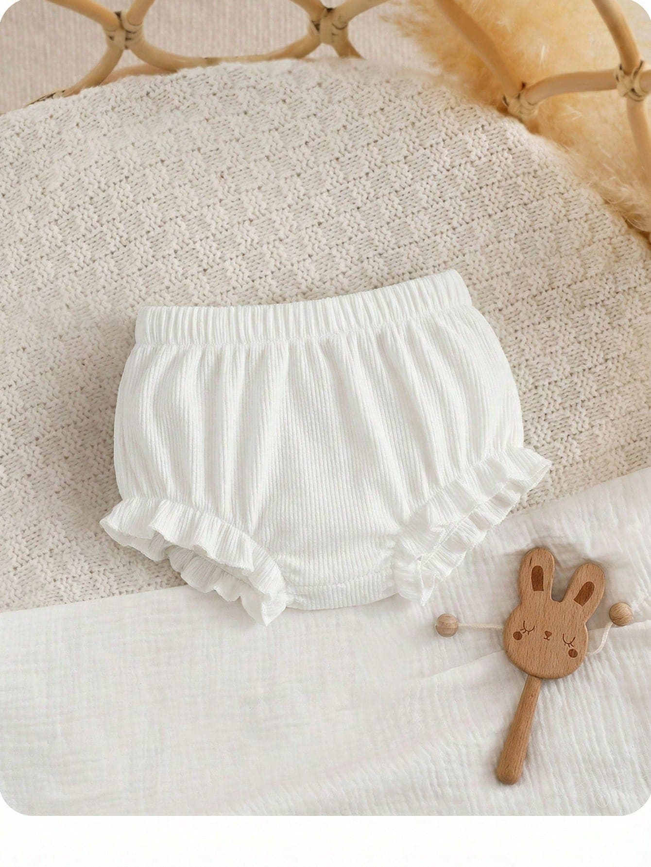 SHEIN Newborn Baby Casual Solid Color Ribbed Knit Elastic Waist Ruffle Hem Romper Shorts