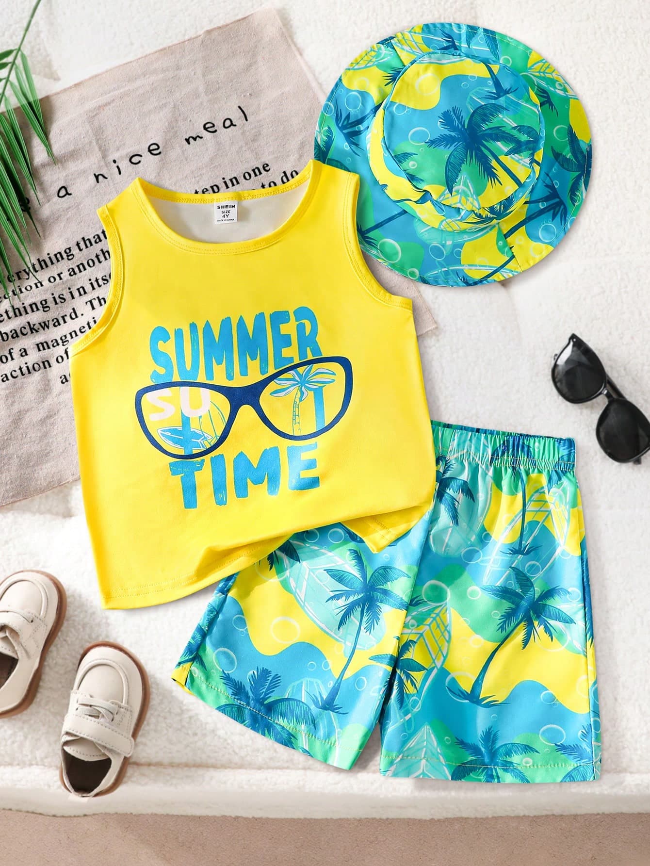 SHEIN Playful Pals Young Boys 3-Piece Summer Beach Set,Hawaiian Style Sleeveless Vest,Palm Tree Print Shorts & Sun Hat,Kids Holiday Vacation Water Play Outfit,4-7 Years