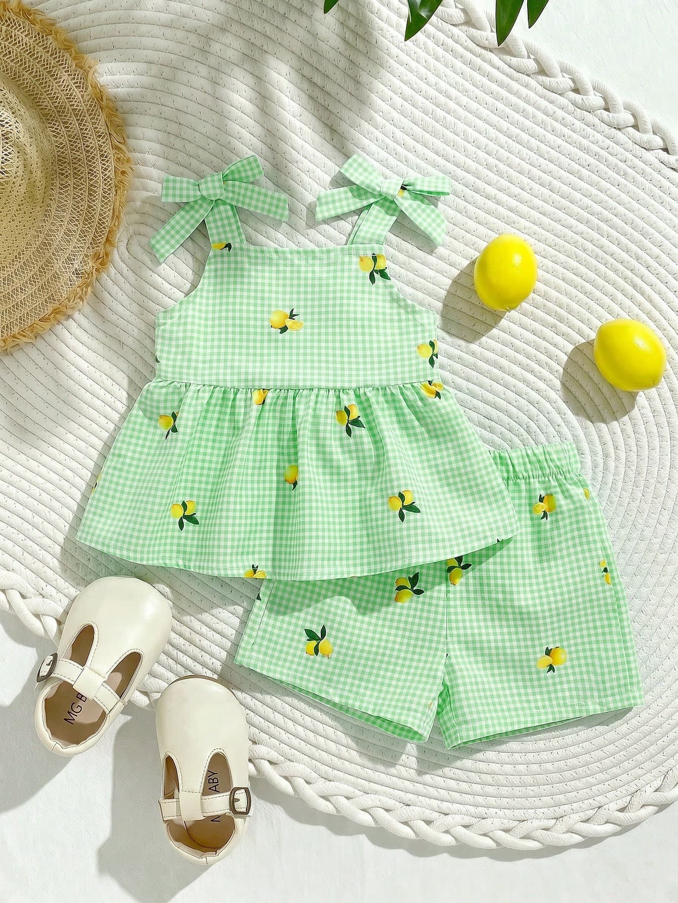 SHEIN Playful Pals 2pcs Baby Girl Toddler/Newborn 0-3 Years Old Spring/Summer Casual Daily Vacation White Bow Decor Lemon Print Camisole Top + Shorts Set