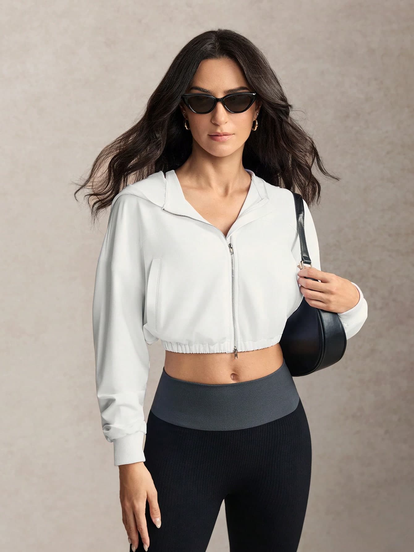 Activina Women's White Hooded Sweatshirt With Slanted Pockets Sports Sweatshirt Jacket  For Daily Fitness Fitness & Gym  Running Yoga Pitalles Indoor