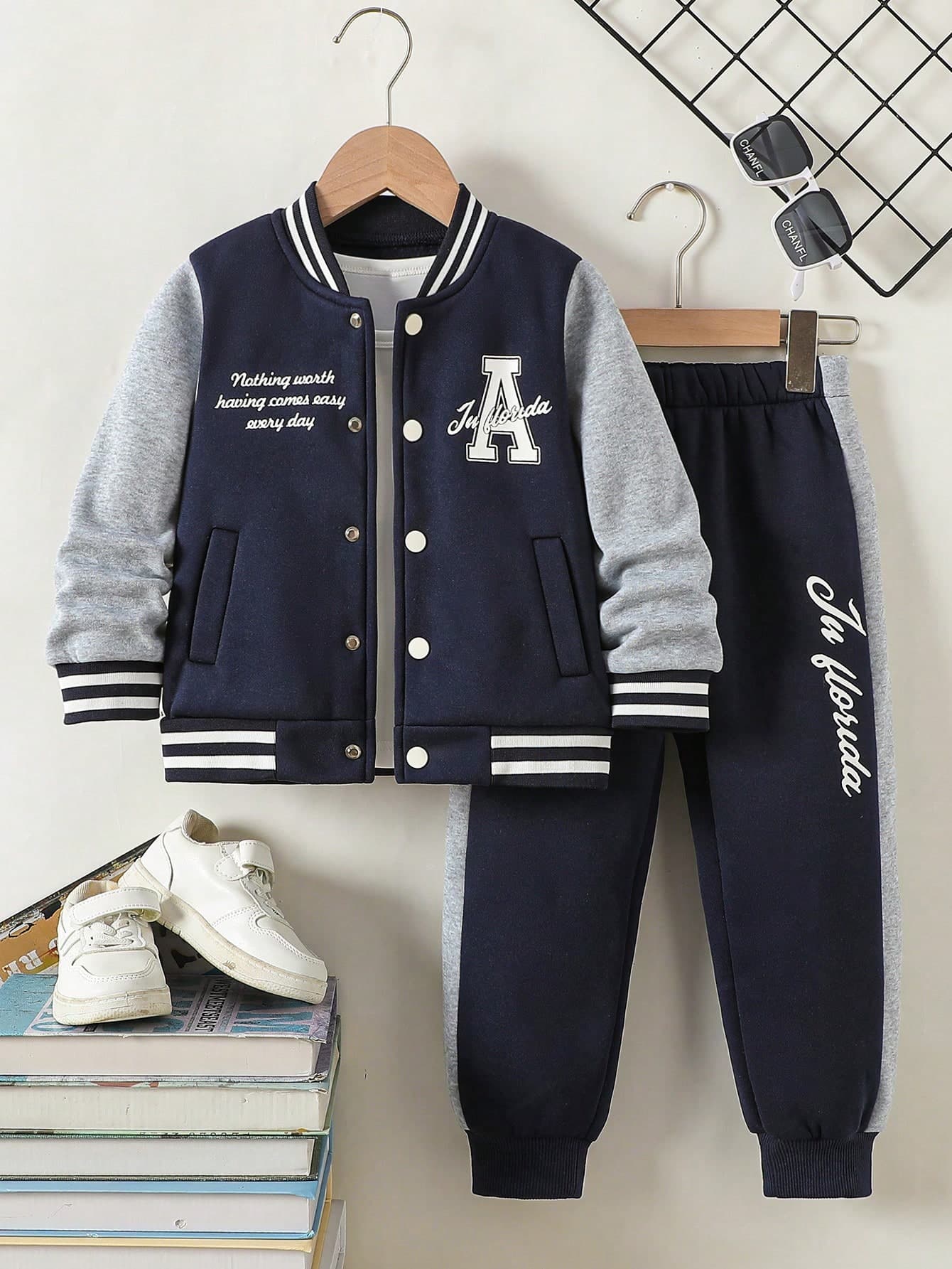 SHEIN Genkimix Kids Young Boys Academy Style 2-Piece Set, Black Knit Top With White Sleeve Contrast, Personalized Large Capital Letter A Print On Left Front, Matching Printed Sports Long Pants, Ribbed Collar, Cuffs, Hem And Pant Cuffs, Elastic And Comfortable, Casual Minimalist Style Suitable For Spring And Autumn Daily Wear