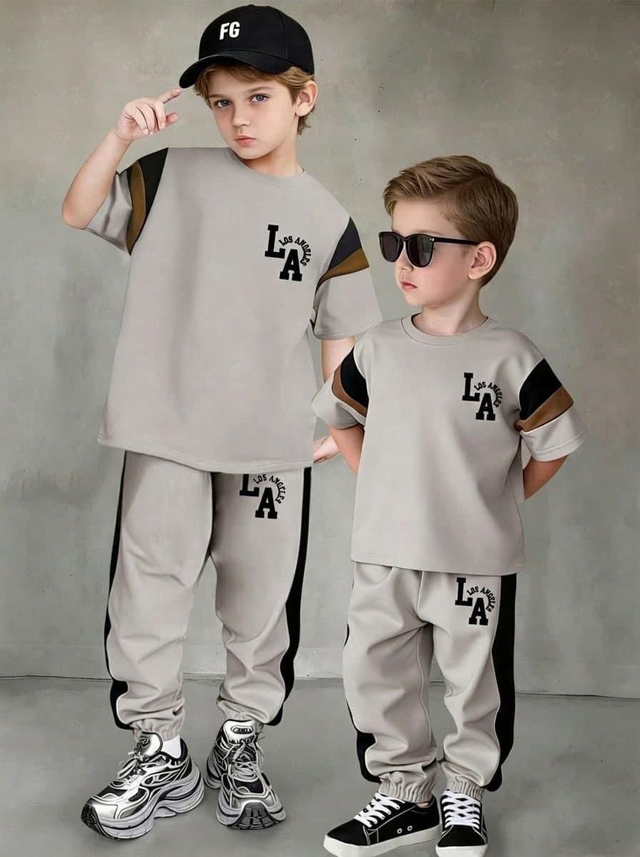 Young Boy Cartoon Print Round Neck Short Sleeve Top And Pants Set