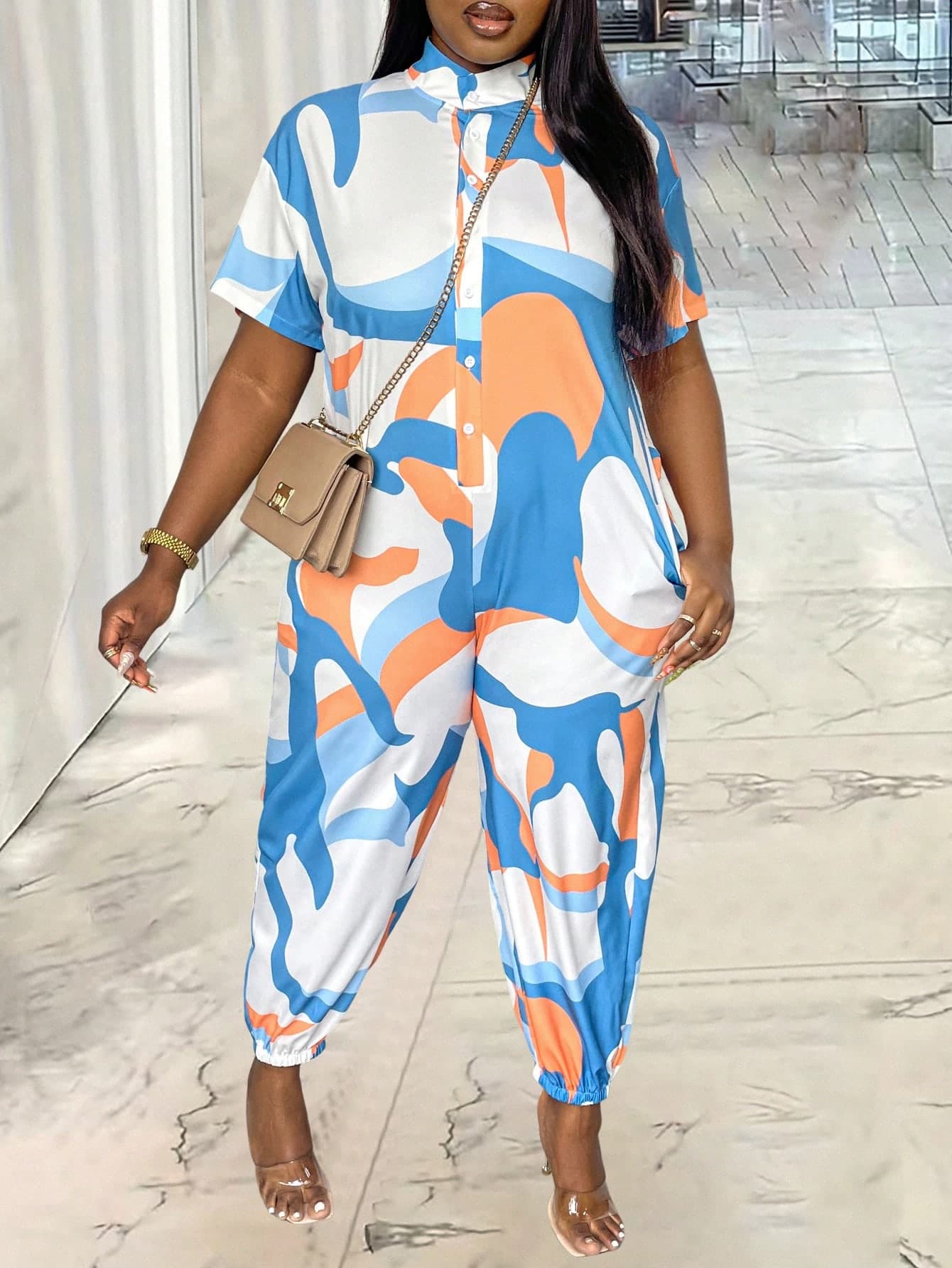 SHEIN LUNE Plus Size Women's Stand Collar Short Sleeve Jumpsuit With Geometric Print
