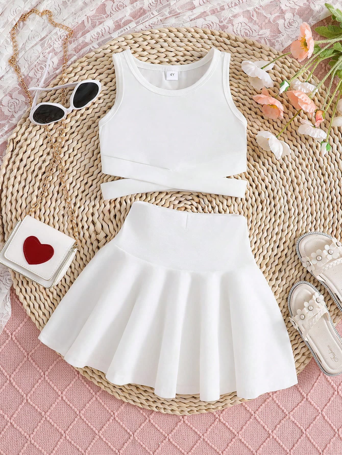 Young Girl Solid Colored Top And Skirt Set
