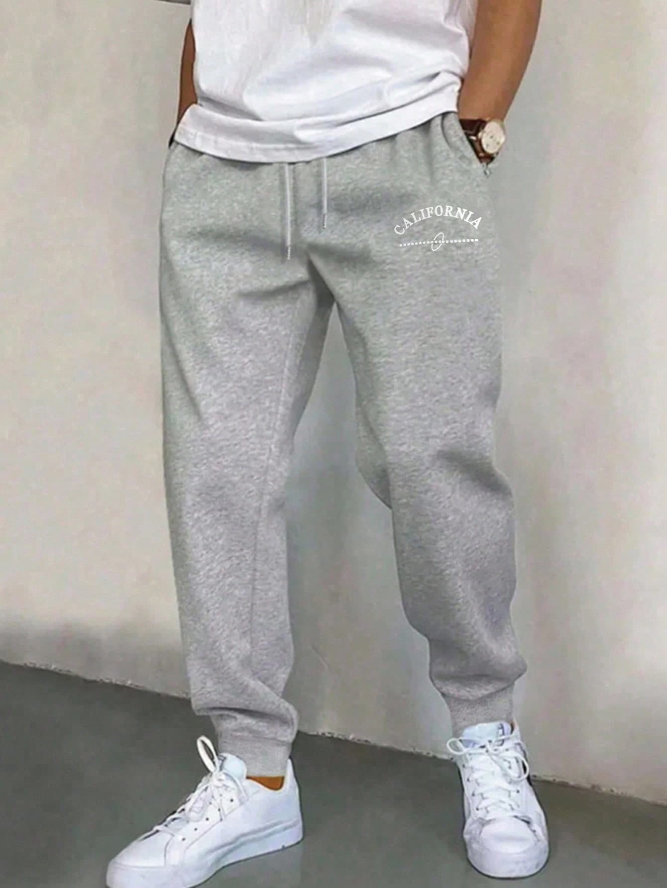 SHEIN Mirajuku Casual Loose Fit Graphic Print Pocket Design Sweatpants For Teenage Boys, Suitable For Daily Casual, Commuting And Sports Wear