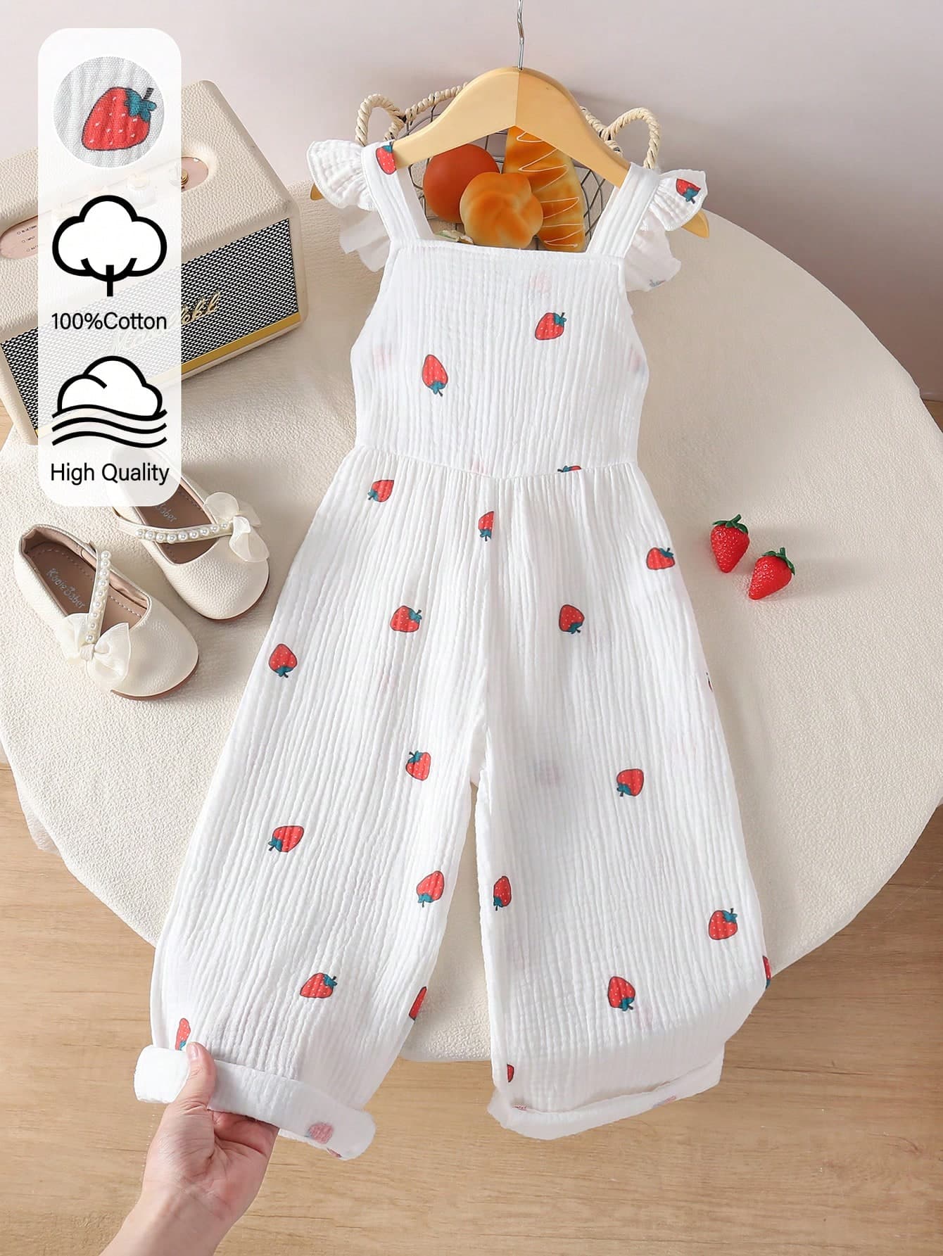 1pc White Sleeveless Cherry Print Jumpsuit With Suspender Design For Young Girls, Featuring Cute Flutter Sleeves And Red Trim, Relaxed Fit For Casual