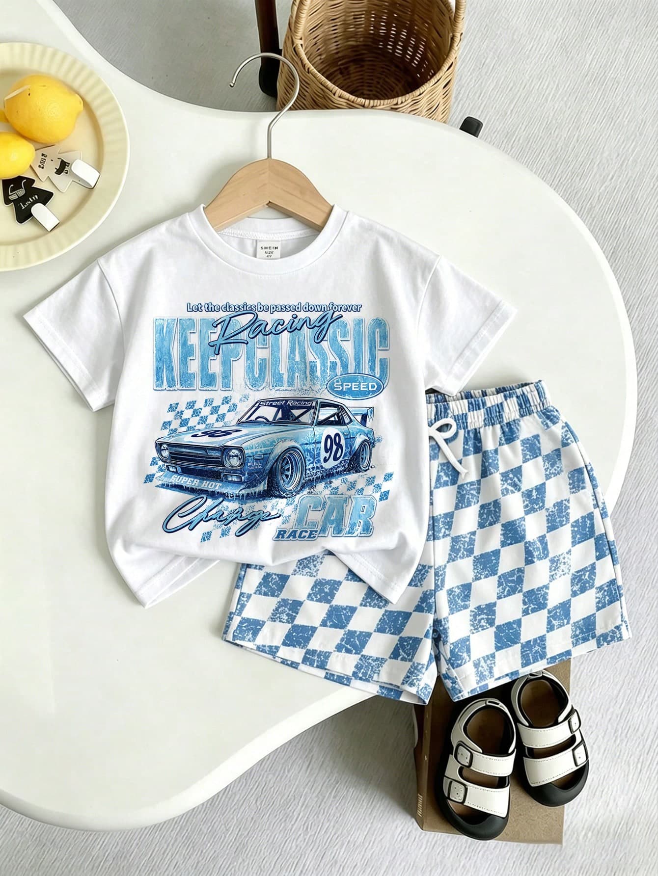 SHEIN Playful Pals 2pcs Young Boys T-Shirt Set, Summer Ice Cube Cool Racing Car Letter Print Short Sleeve Round Neck T-Shirt, Paired With Fashionable Elastic Waist Plaid Printed Shorts, Soft Stretchy Fabric, Loose Fit, Casual & Comfortable Boys Outfit Set, Suitable For Outings, Street Style, Home, Travel, Vacation, Daily Wear