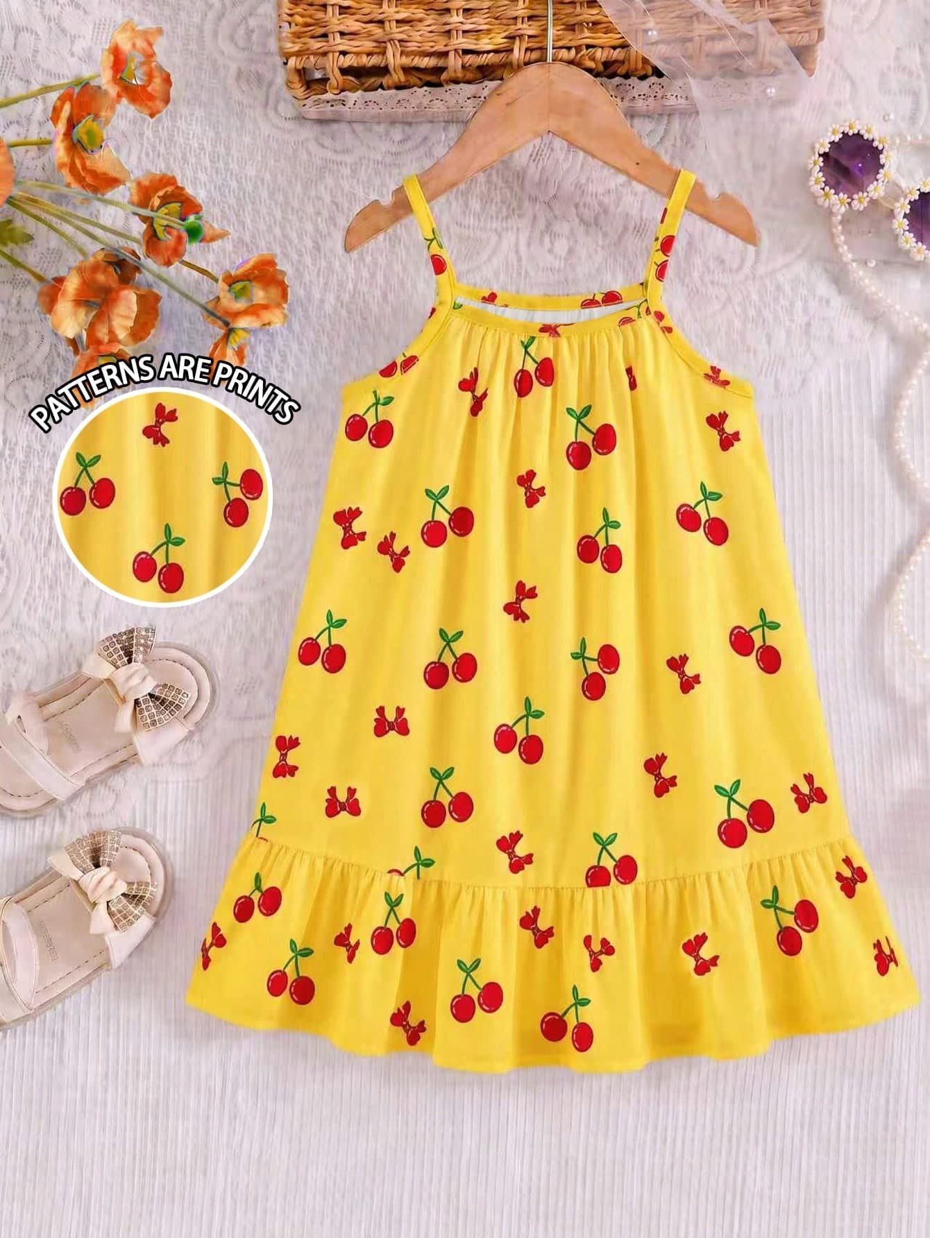 SHEIN Elladie kids Young Girls Fashionable Cute Bright Color Bow & Cherry Print Spaghetti Strap A-Line Dress, Soft Fabric, Summer Vibrant Youthful Style, Suitable For Outings